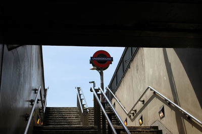 Low angle view of red staircase against sky