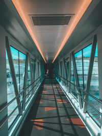 Elevated walkway in illuminated building