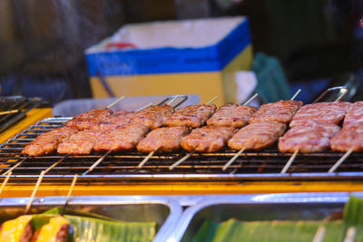 Grill sour meatball in ho thi ky street, ho chi minh city, vietnam