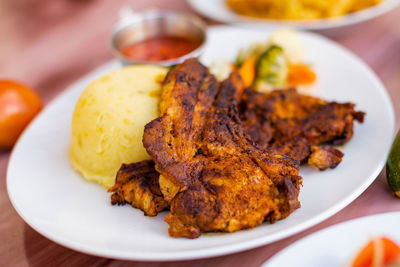 Close-up of food in plate on table