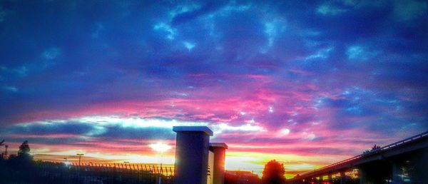 Low angle view of cloudy sky at sunset