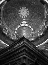 Low angle view of illuminated ceiling in building