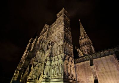 Low angle view of building against sky at night