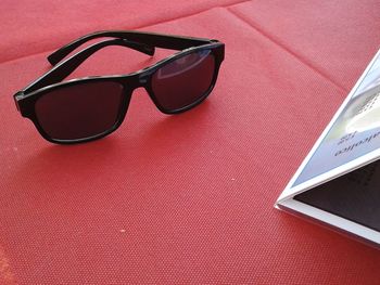 Close-up of sunglasses on table