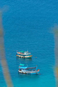 High angle view of ship sailing in sea