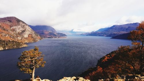 Scenic view of sea against cloudy sky