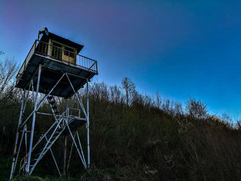 Low angle view of built structure against blue sky