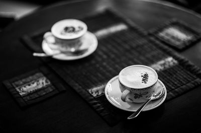 Close-up of coffee cup on table