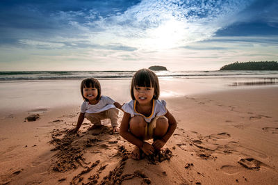 Portrait of a boy standing on beach