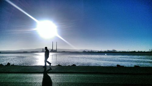 Sun shining over sea