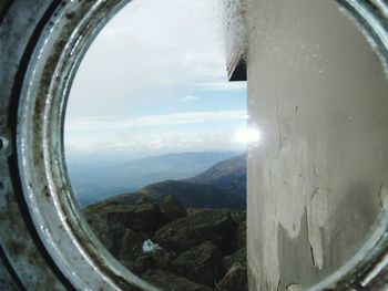 View of landscape against cloudy sky