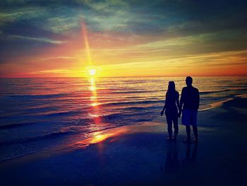 Scenic view of sea at sunset