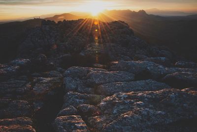 Scenic view of mountains against sky during sunset