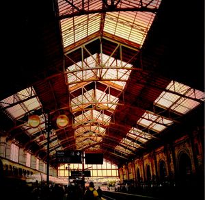 Low angle view of illuminated ceiling