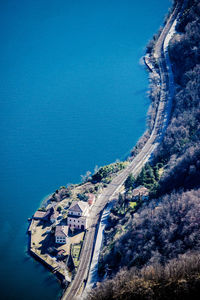 High angle view of sea against blue sky