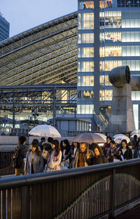 Group of people in front of building
