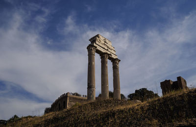 Low angle view of old ruin building against sky