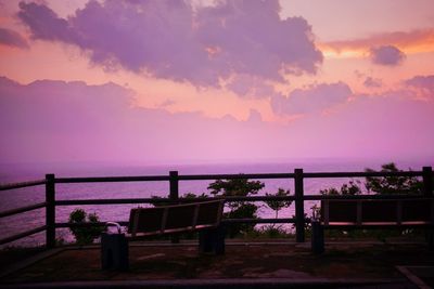 Scenic view of landscape against sky at sunset