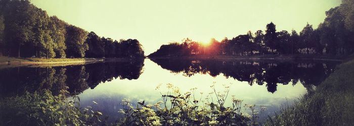 Scenic view of lake at sunset