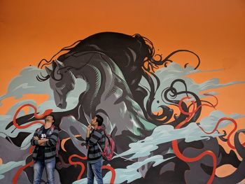 Shadow of people on wall