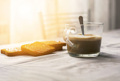 Close-up of coffee cup on table