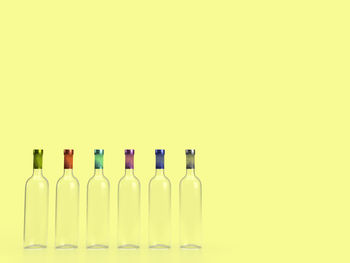 Close-up of bottles against white background