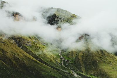 High angle view of fog covered hills 