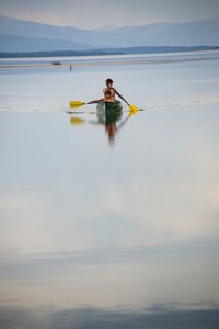 Silhouette of woman in water