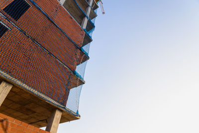 Low angle view of building against clear sky