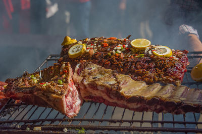 Close-up of food on barbecue grill in san telmo market, buenos aires, argentina