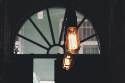 Close-up of illuminated light bulb