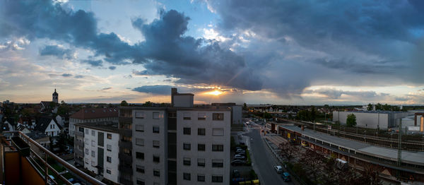 High angle view of illuminated city against sky