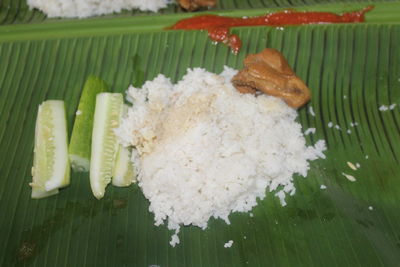 High angle view of food on leaves