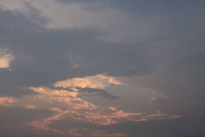 Low angle view of clouds in sky during sunset