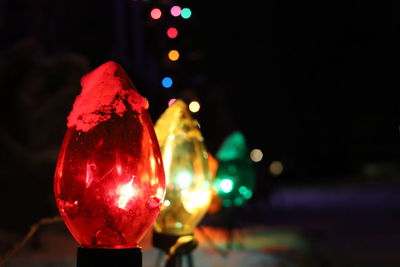 Close-up of illuminated light bulb