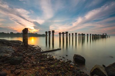 Scenic view of sea against sky at sunset