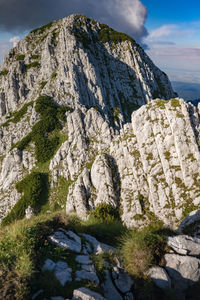 Scenic view of rock formation against sky