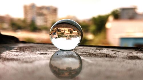 Reflection of buildings on crystal ball