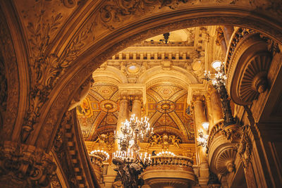 Low angle view of ornate ceiling of building