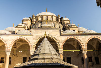 Low angle view of historic building against clear sky