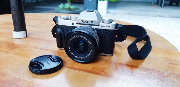 Close-up of camera on table