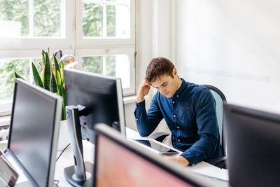 High angle view of man working at office