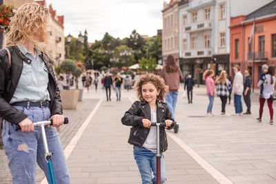 People on street in city