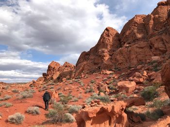 Low angle view of man on rock formation