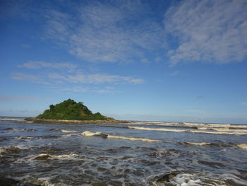 Scenic view of beach against sky