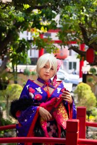 Portrait of young woman in traditional clothing