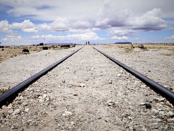 Railroad track against sky