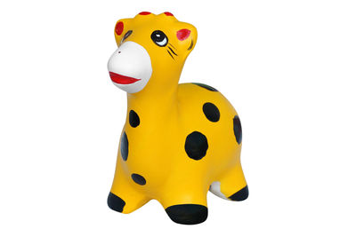 Close-up of a stuffed toy over white background