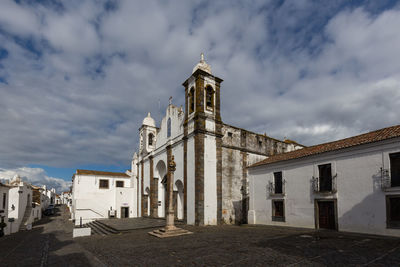 View of historical building against cloudy sky