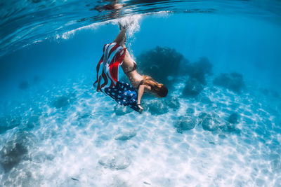 Man swimming in sea